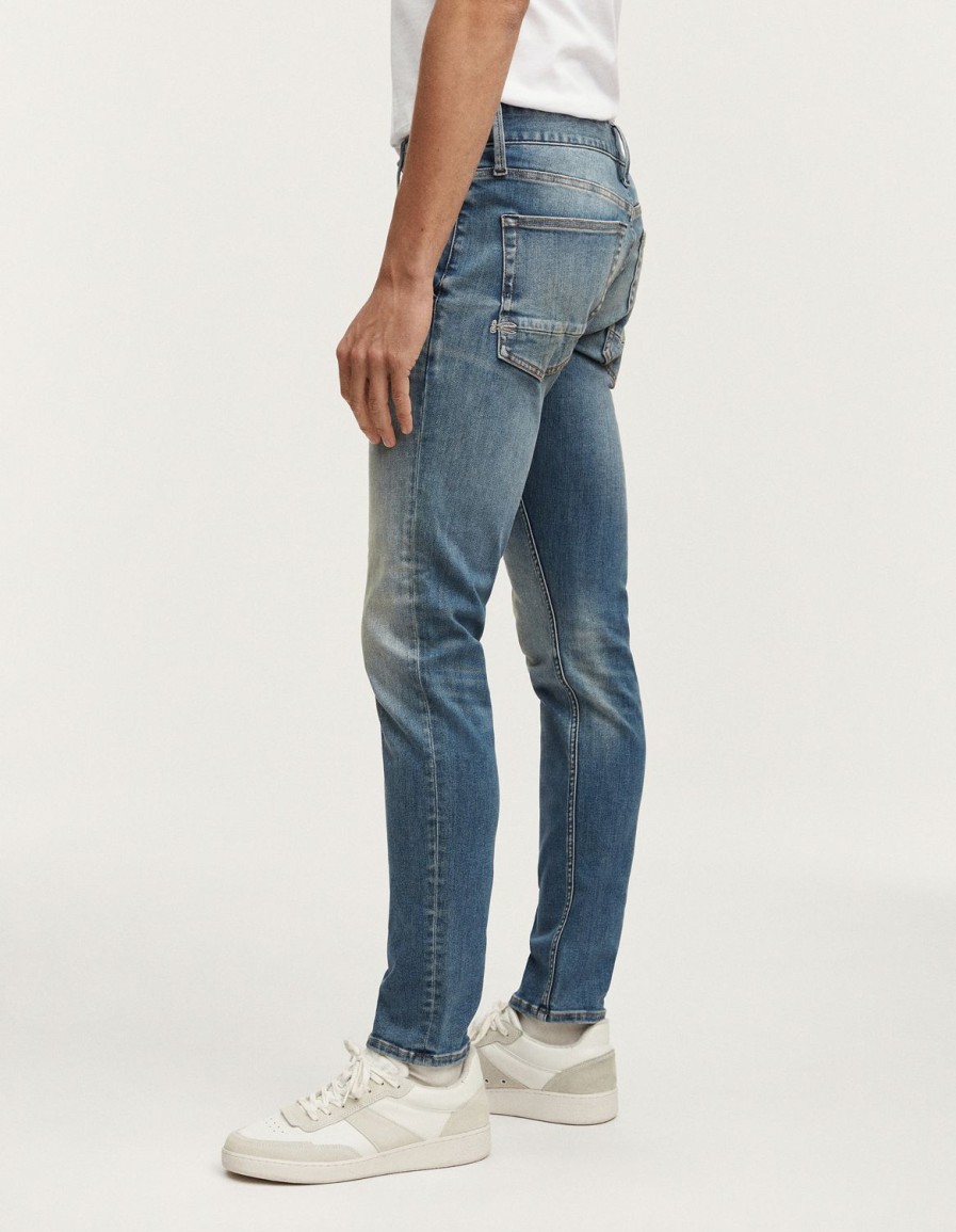 Heren Denham Jeans | York Free Move Indigo Toelopende Pasvorm Middenblauw